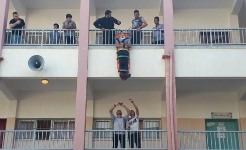 الدفاع المدني يُخلي مدرسة جنوب مدينة غزة ضمن مناورة حية