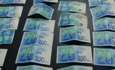 بيت لحم: الشرطة تكشف شبكة ترويج عملة مزيفة وتضبط 13 ألف شيقل مزيفة