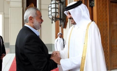 أمير قطر تميم بن حمد ورئيس المكتب السياسي لحماس إسماعيل هنية