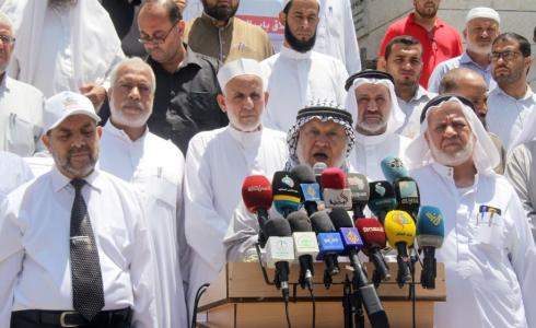 وقفة بغزة رفضاً للاعتداء على باب الرحمة