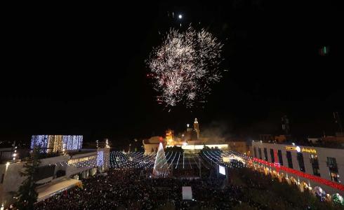 إضاءة شجرة الميلاد في ساحة المهد