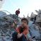 أطفال يقفون على أنقاض منازلهم المدمرة جراء الحرب على غزة - ارشيف