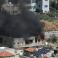 النيران تلتهم المنزل الذي يحاصره الجيش في جنين بعدما أطلقت القوات عليه صواريخ مضادة