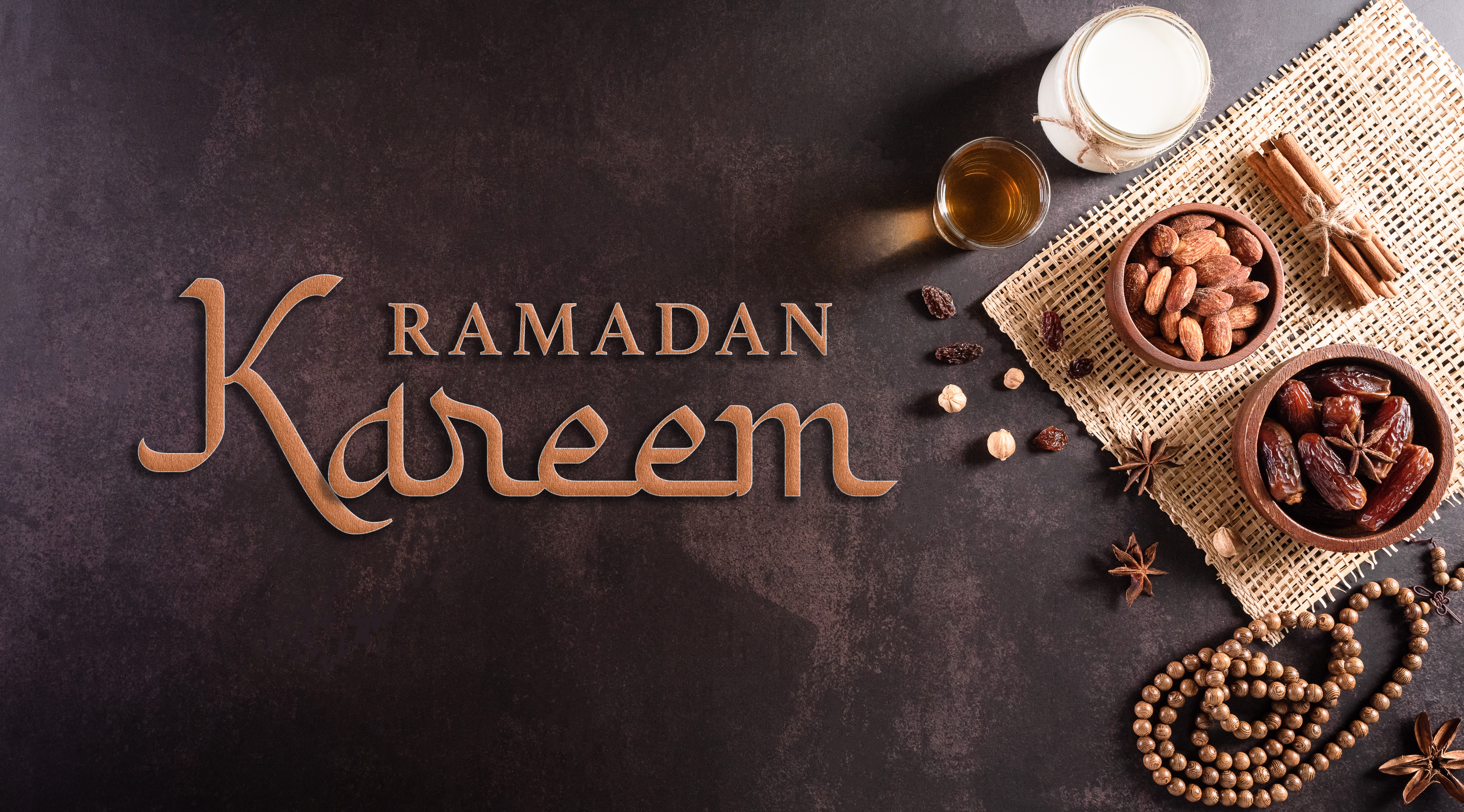 table-top-view-image-decoration-ramadan-kareem-dates-fruit-milk-almond-dark-stone-background-flat-lay-with-copy-space.jpg