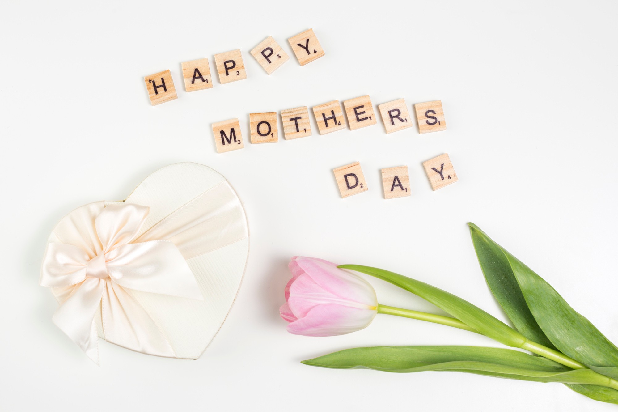 happy-mothers-day-inscription-with-tulip-gift.jpg