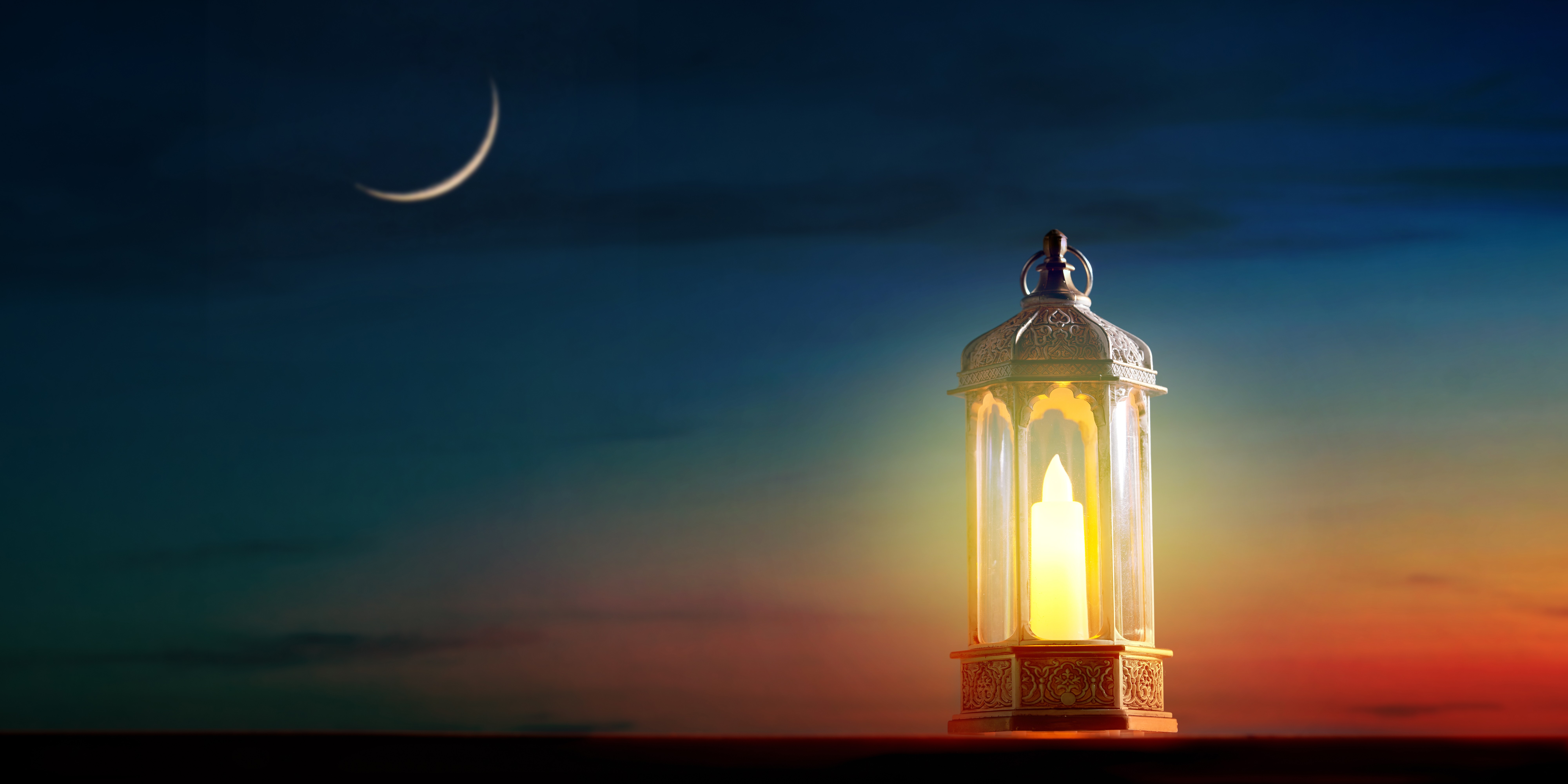 muslim-holy-month-ramadan-kareem-ornamental-arabic-lantern-with-burning-candle-glowing-with-crescent-moon.jpg
