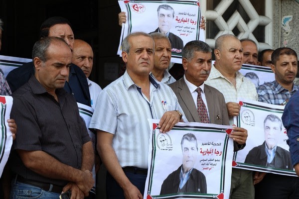لجنة الأسرى للقوى والشعبية تنظمان في غزة وقفة تضامنية مع القيادي رجا اغبارية.jpg